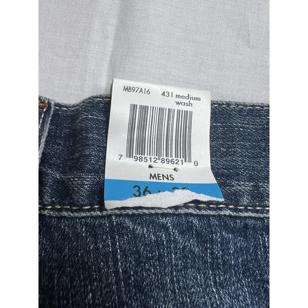Calvin Klein Men's Jeans 36x32‎ Easy Fit Tapered leg Medium Wash Cotton